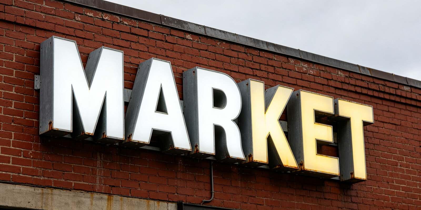 Comparison of new clear acrylic versus old yellowed cracked sign face