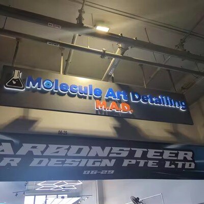 Custom channel letters at auto detailing shop, verified buyer photo